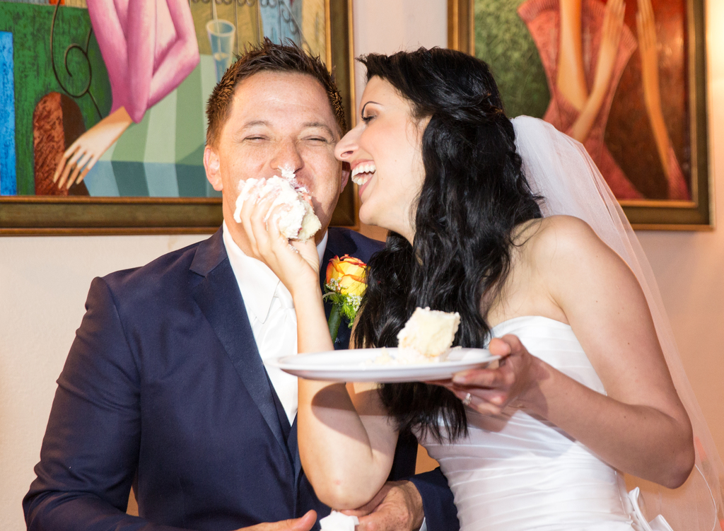 Michel Szabo and Anna Szabo Eating Cake at Their Wedding 